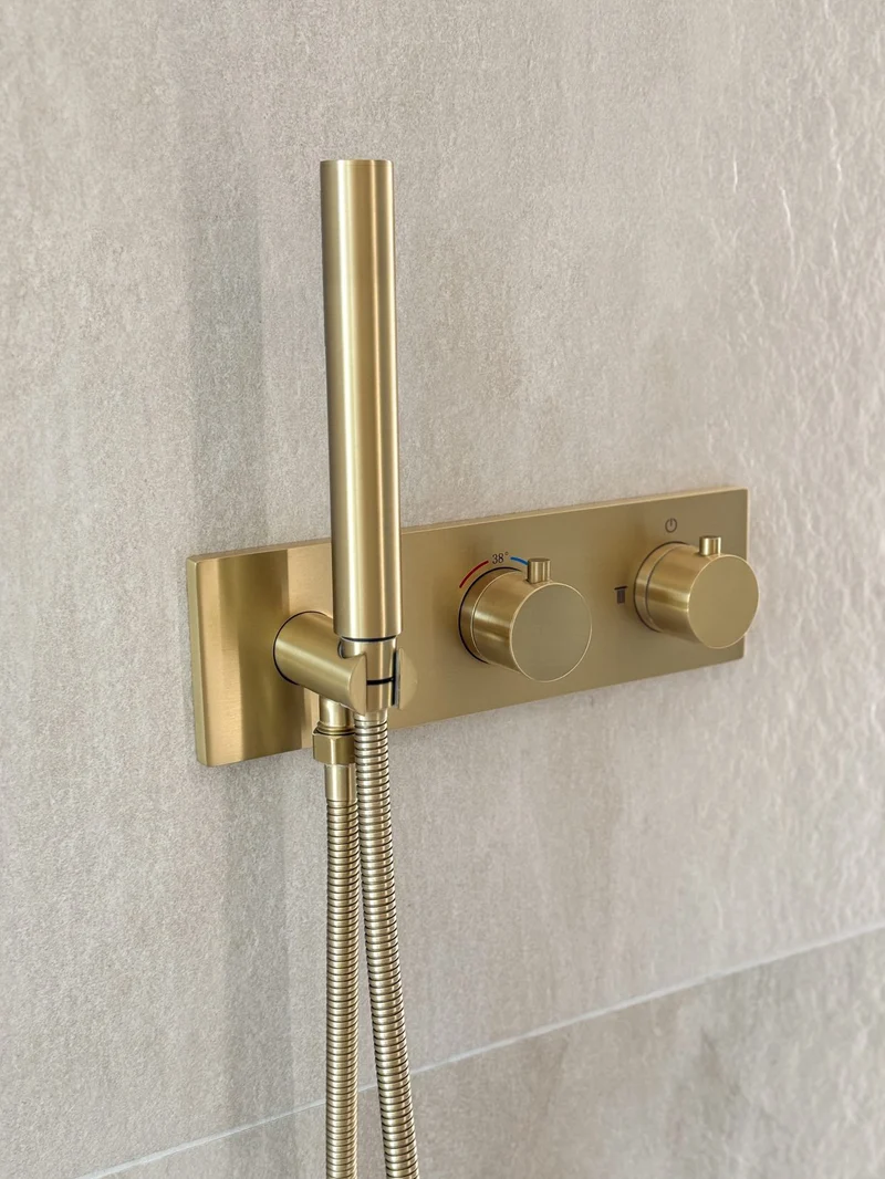 Colonne de douche thermostatique encastrée or brossé