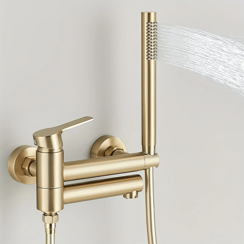 Mitigeur bain-douche mural doré avec douchette et flexible