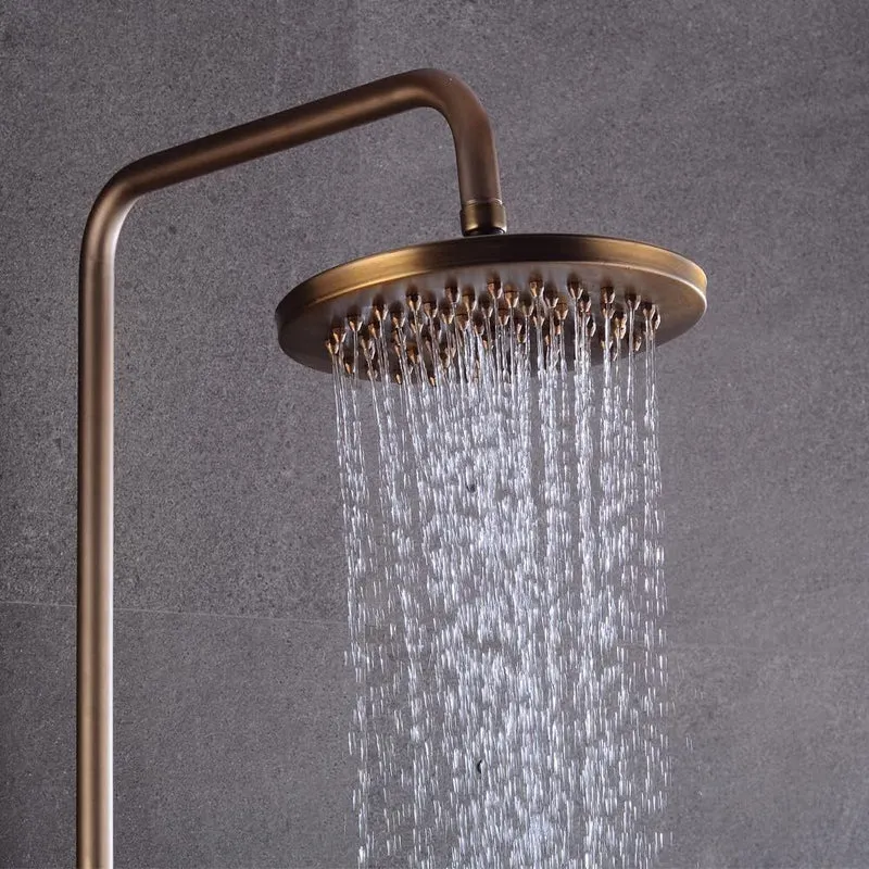 Colonne de douche rétro en bronze avec ciel de pluie rond et douchette