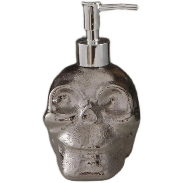 Distributeur de savon tête de mort argentée
